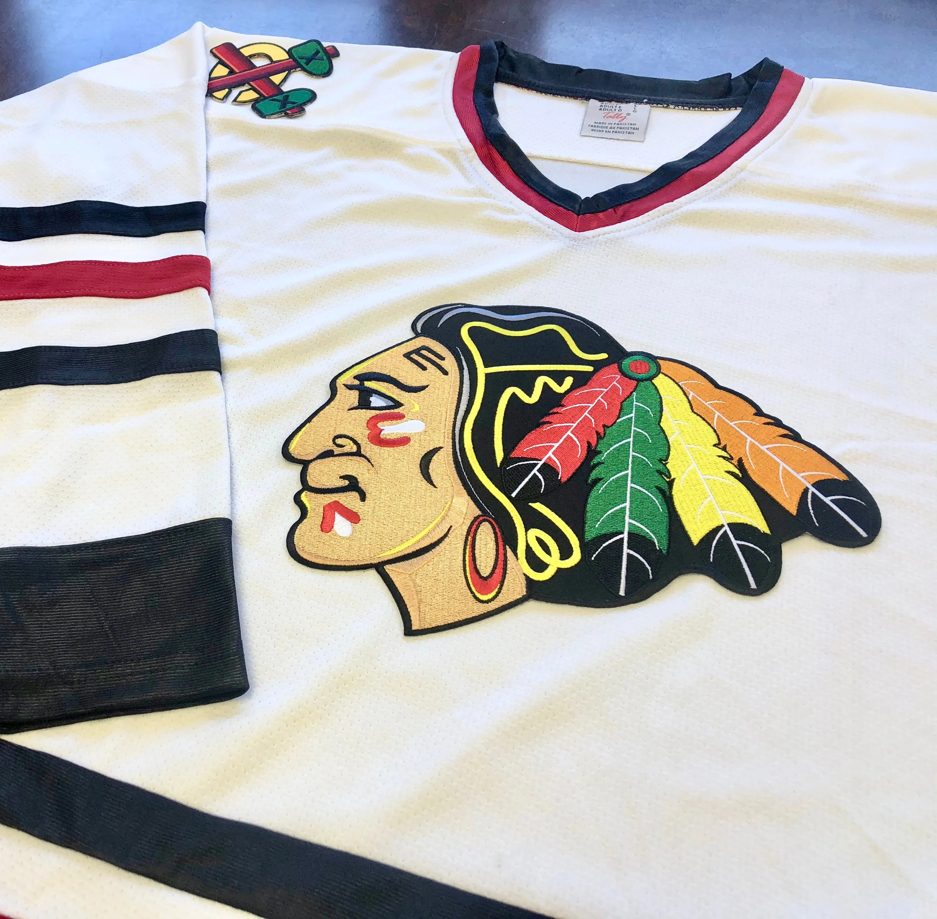 Custom Hockey Jerseys with a Blackhawk Logo and Shoulder Patches