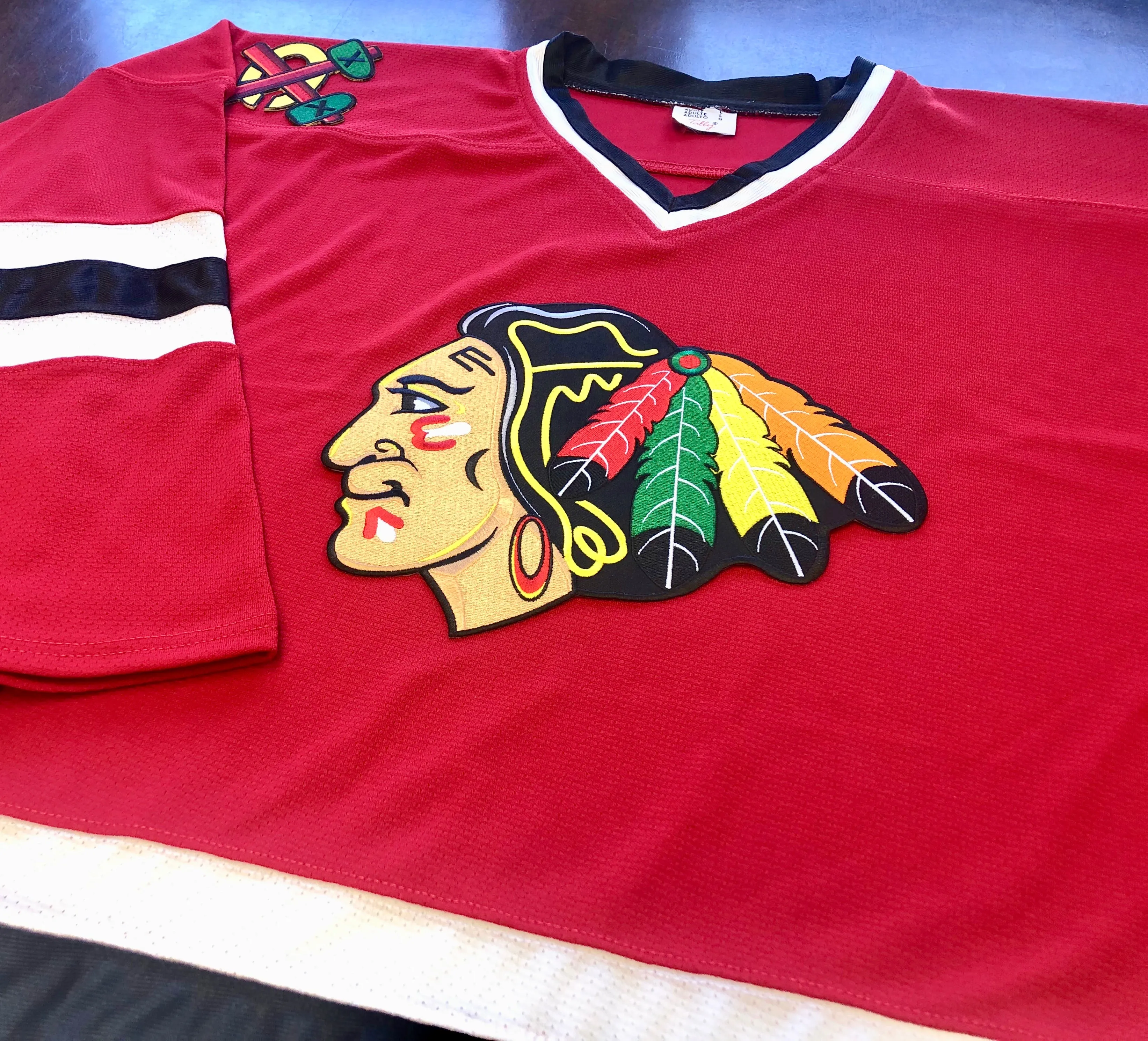 Custom Hockey Jerseys with a Blackhawk Logo and Shoulder Patches