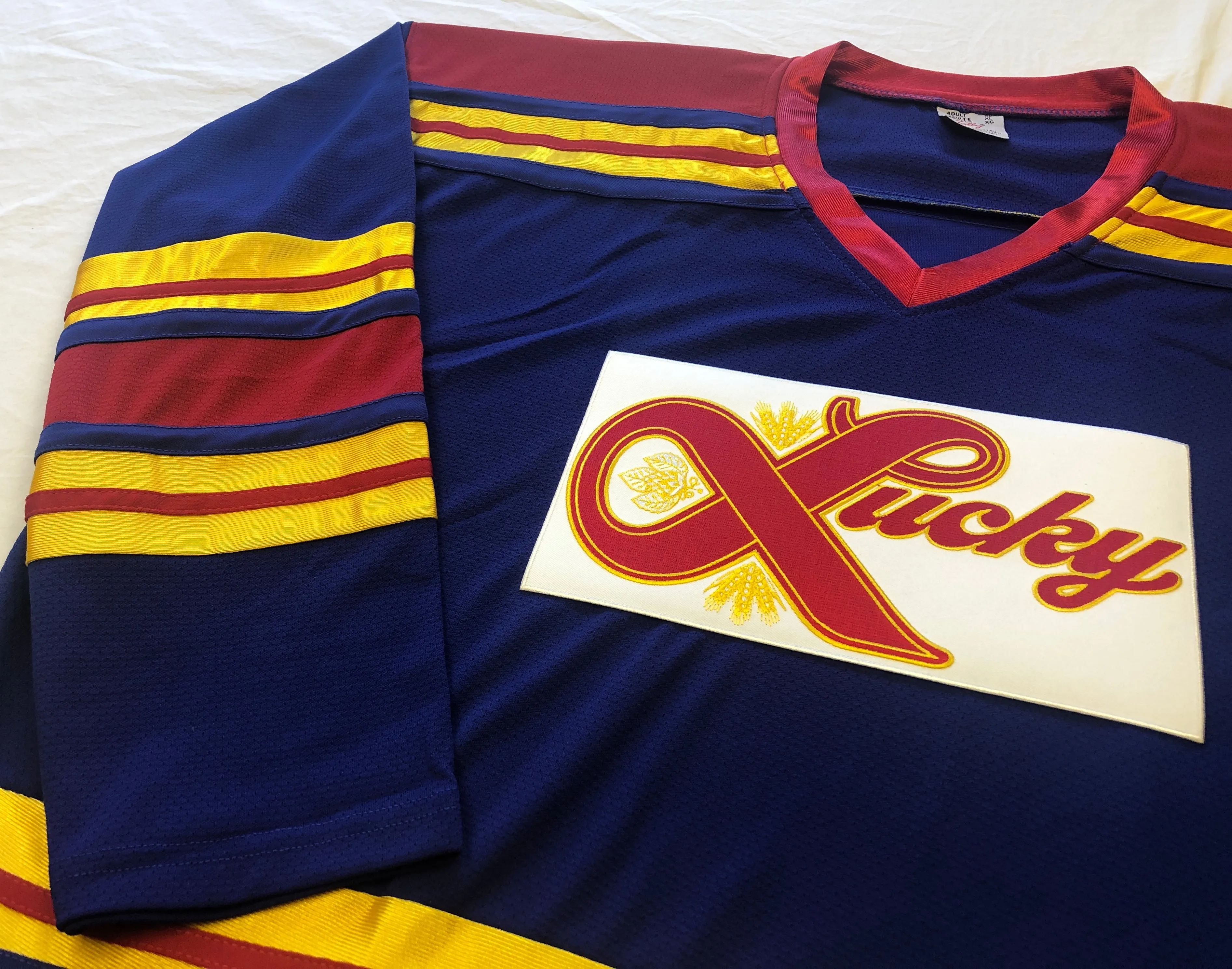 Custom Hockey Jerseys with a Lucky Embroidered Twill Logo