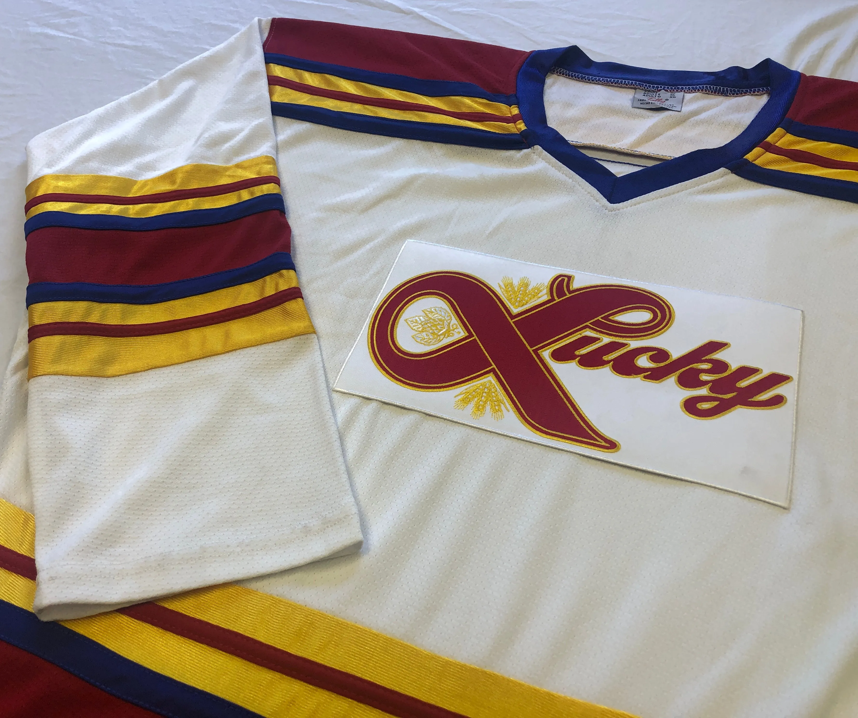 Custom Hockey Jerseys with a Lucky Embroidered Twill Logo