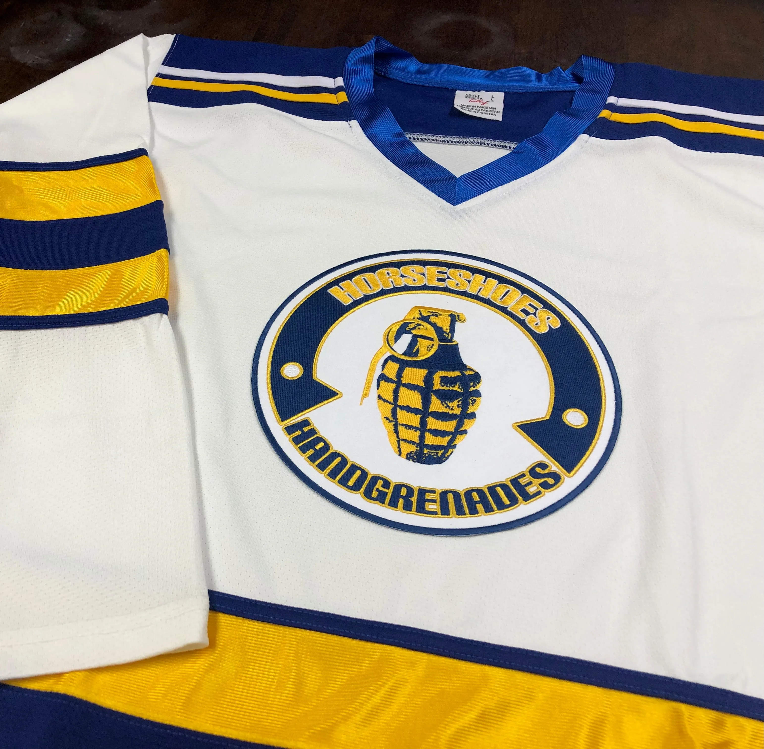 Custom Hockey Jerseys with the Horseshoes and Handgrenades Twill Crest