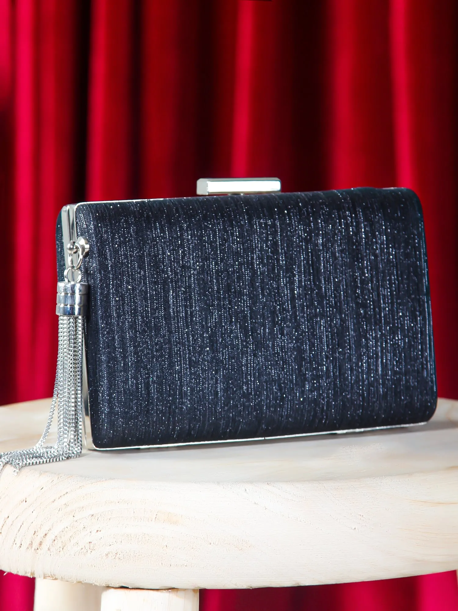 Shimmery Clutch With Fringe