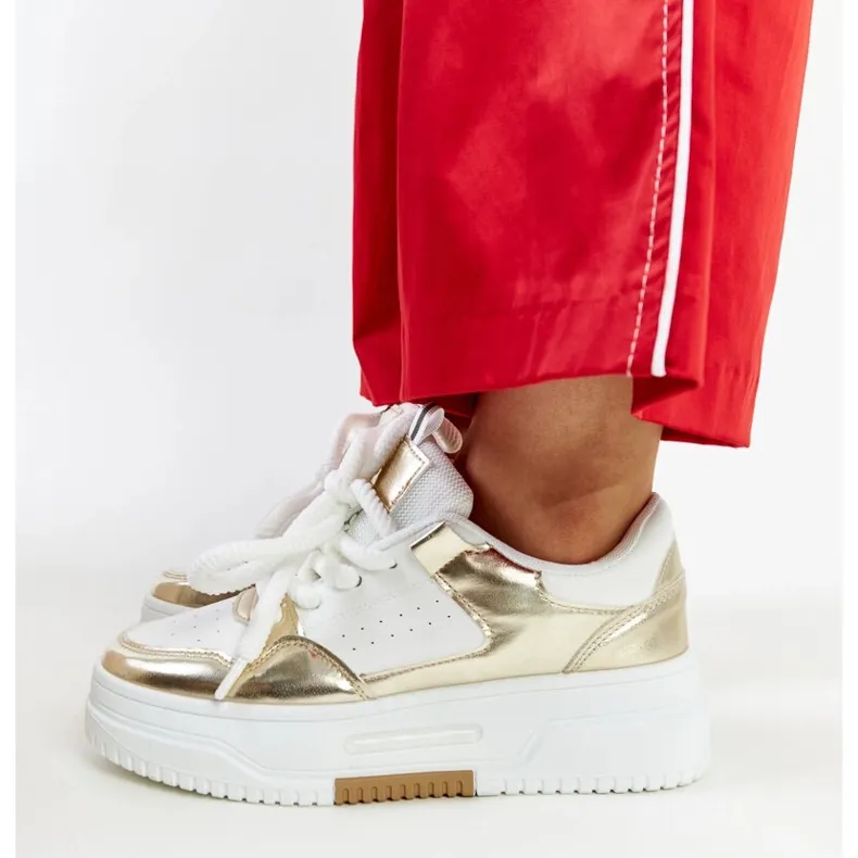 White and gold high platform sneakers from Farkas